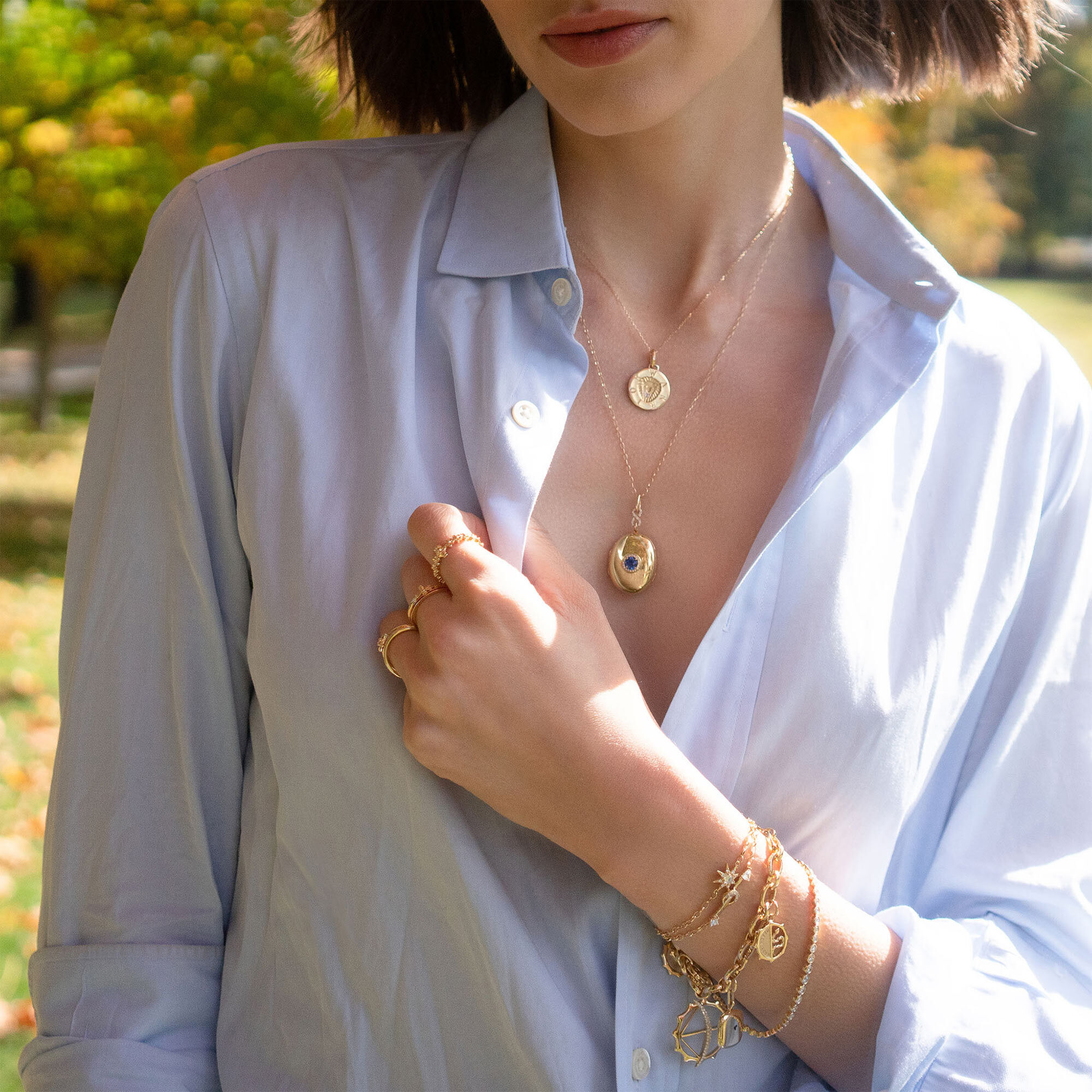 Modern Lockets Yellow Gold Blue Sapphire and Diamond Infinity